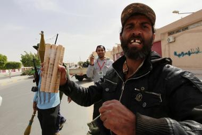 Libijoje per M.Kadhafi sūnaus laidotuves aidėjo šūviai