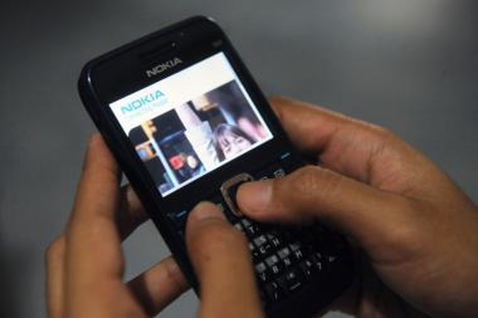 Bandyta įvežti ir netikrų kroksų, ir telefonų