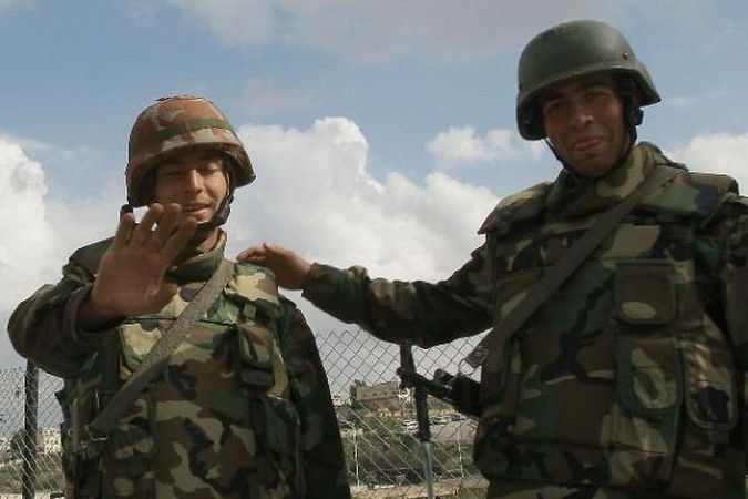 Sirijoje paleisti per 200 politinių kalinių