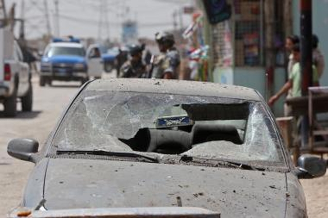 Irake mirtininkui detonavus užminuotą automobilį žuvo 21 žmogus