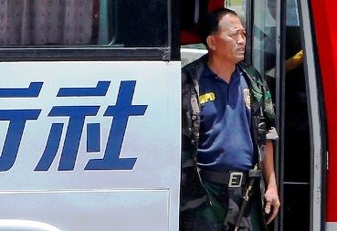 Filipinų užgrobto autobuso drama: paleistas septintas įkaitas