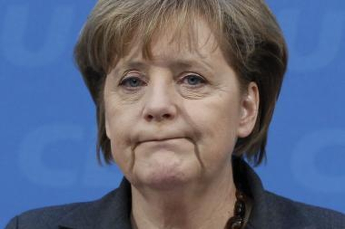 Japoniją apėmusi branduolinė krizė didina spaudimą Vokietijos kanclerei A.Merkel