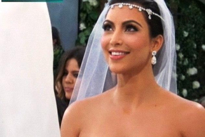 Kaip per vestuves atrodė K.Kardashian?