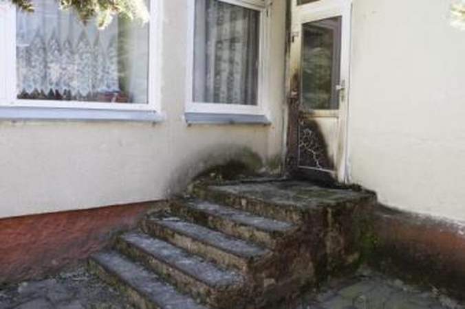 Nuostoliai: policija ieško, kas padegė lopšelio-darželio duris.